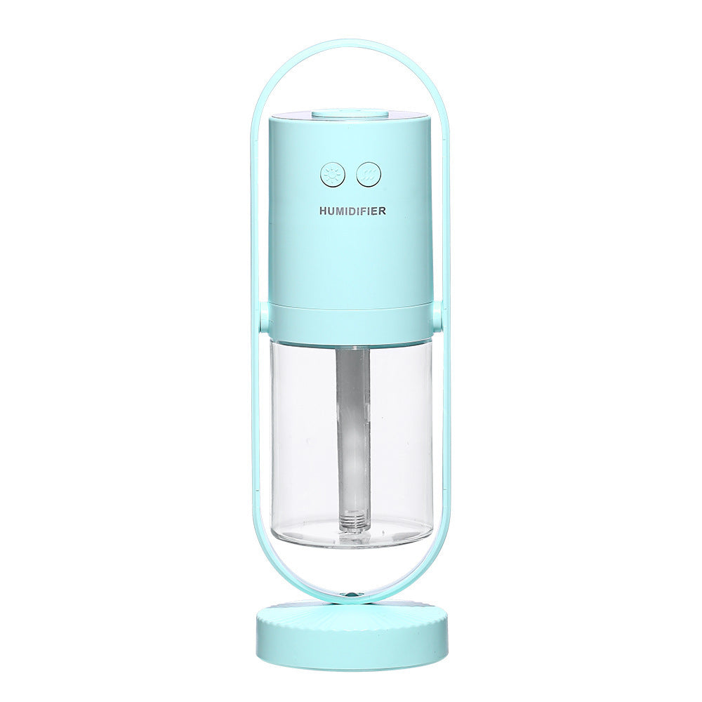 Magic Shadow air humidifier in blue color producing cool mist with soft ambient night light (Color: Blue)