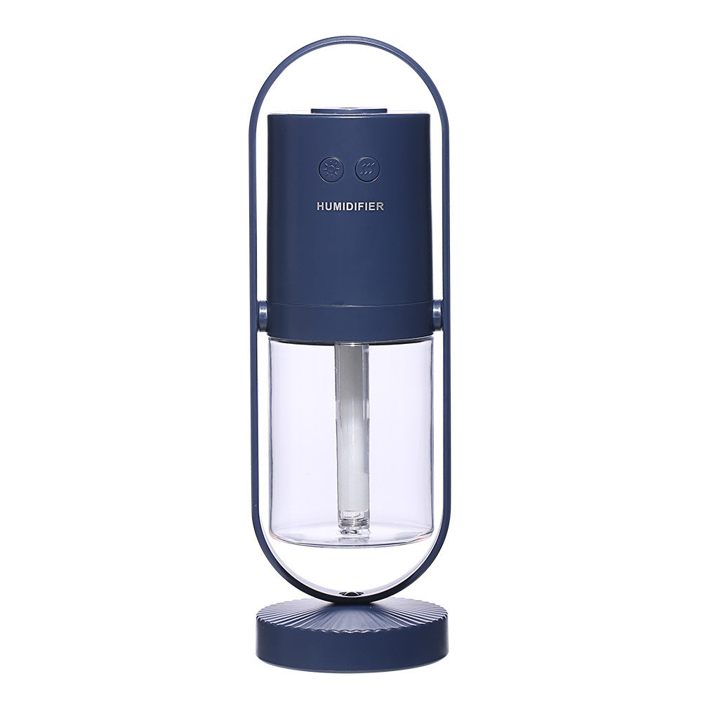 Magic Shadow air humidifier in dark blue color producing cool mist with soft ambient night light (Color: Dark Blue)