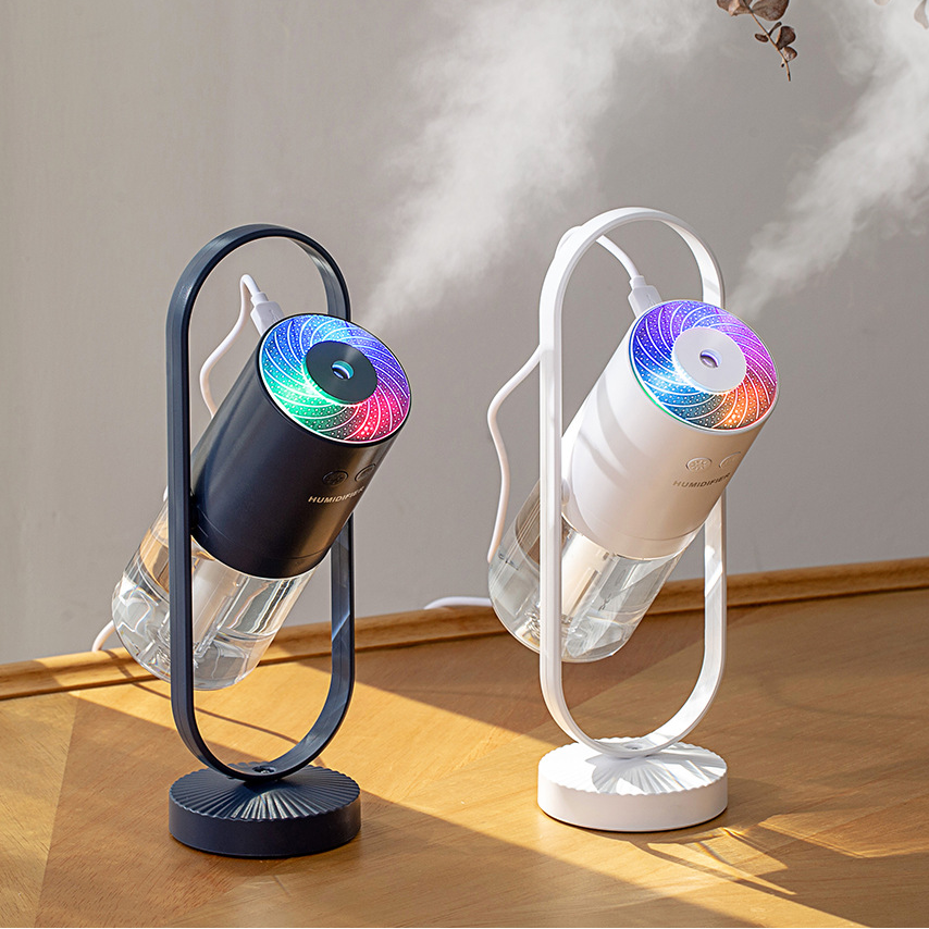 Magic Shadow air humidifier producing cool mist with soft ambient night light duo in light background