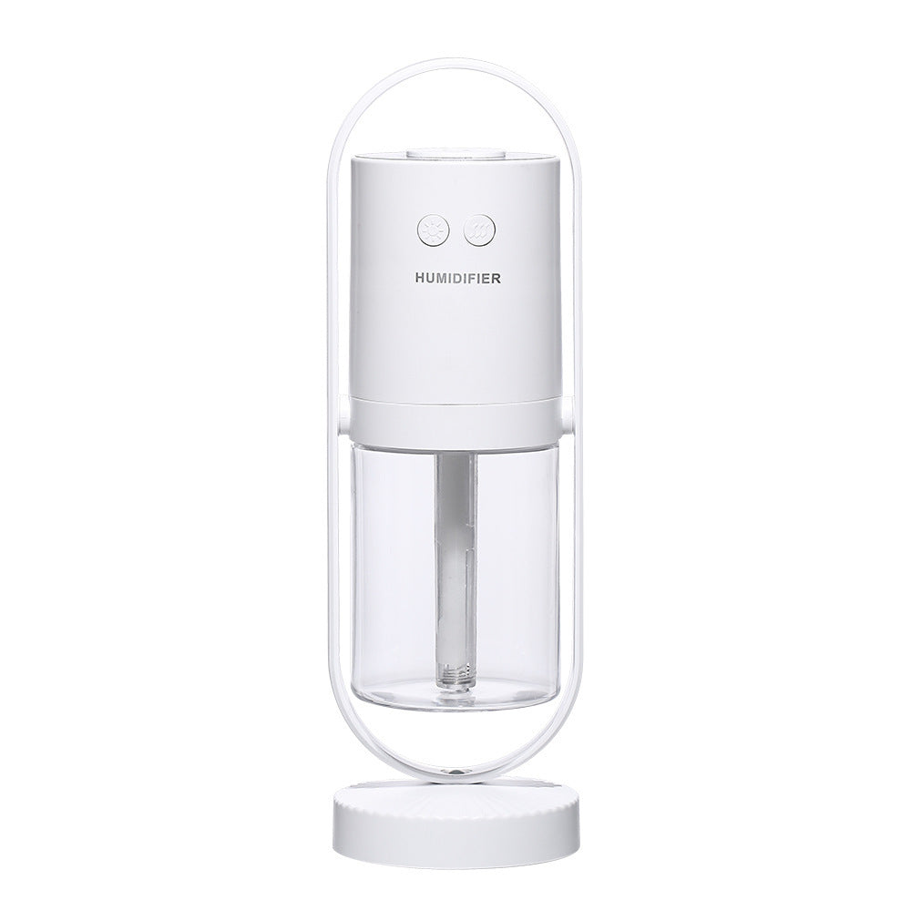 Magic Shadow air humidifier in white color producing cool mist with soft ambient night light (Color: White)