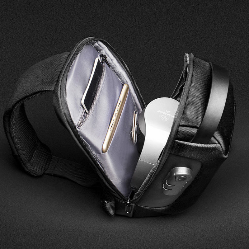 Men’s waterproof sling chest bag with USB charging port and security lock made from Oxford fabric for travel and everyday carry depiction of spacious design