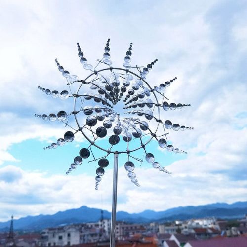 Metal kinetic wind spinner for garden and patio with dual rotating blades and smooth motion product shot