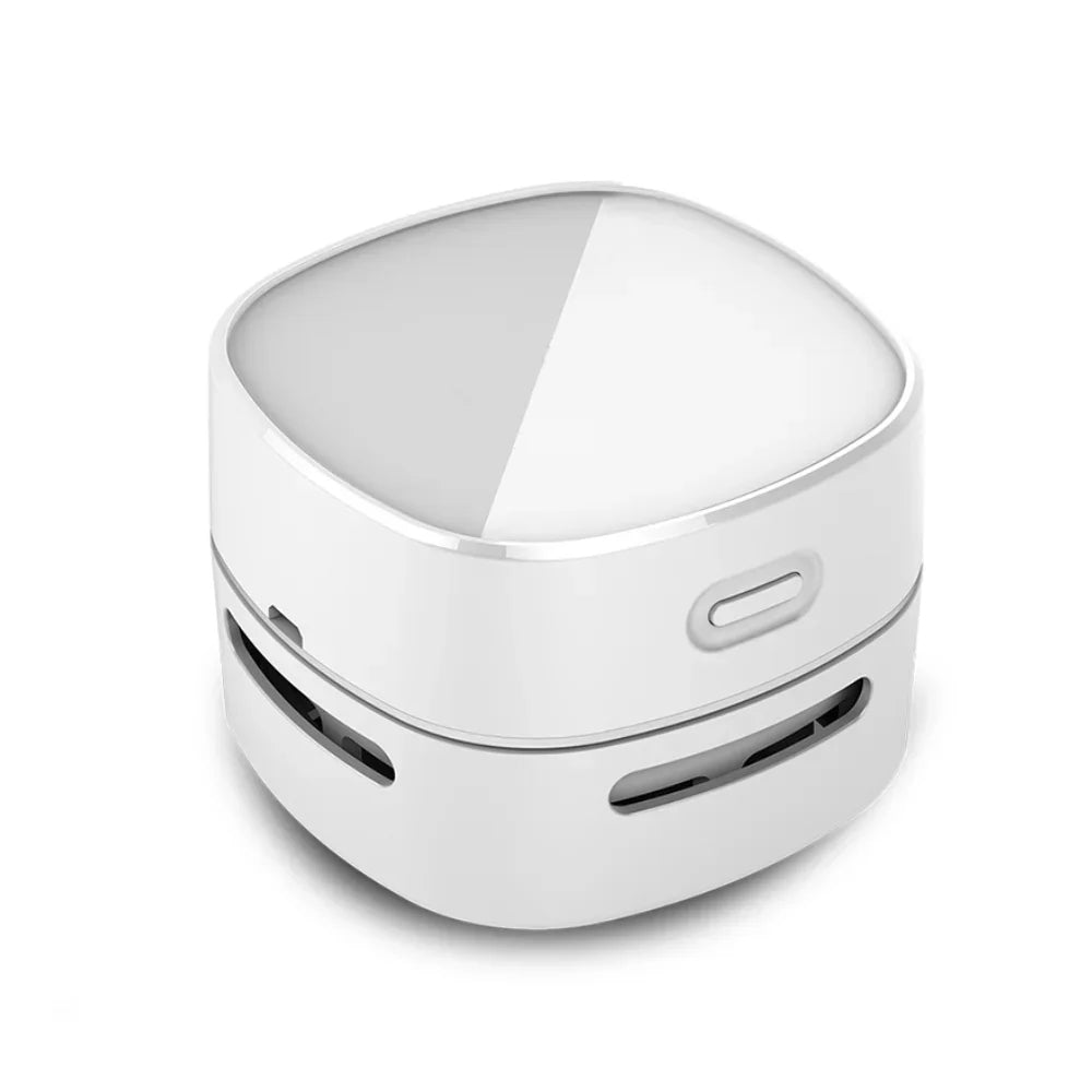 Mini desktop vacuum cleaner cordless device for cleaning desk keyboard and small debris product shot