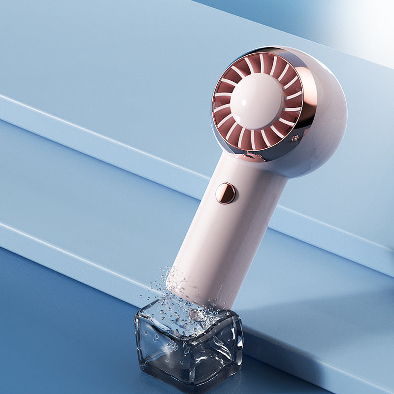 Mini portable turbo fan in pink color with USB rechargeable design for compact personal cooling on the go (Color: Pink)