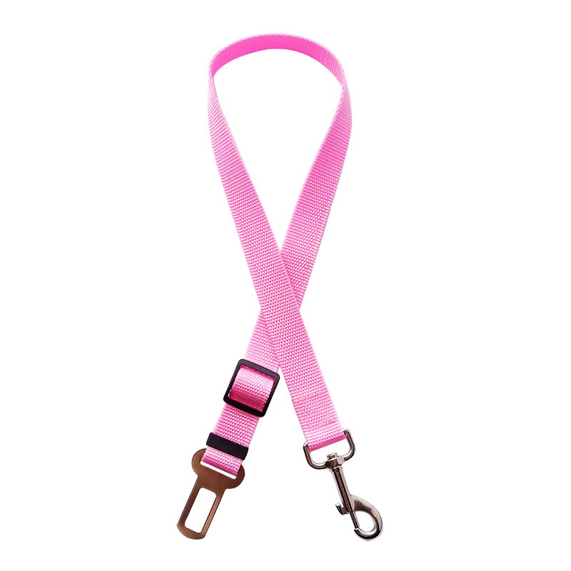 Pet car seat belt in pink color adjustable safety strap for dogs to keep pets secure during travel (Color: Pink)