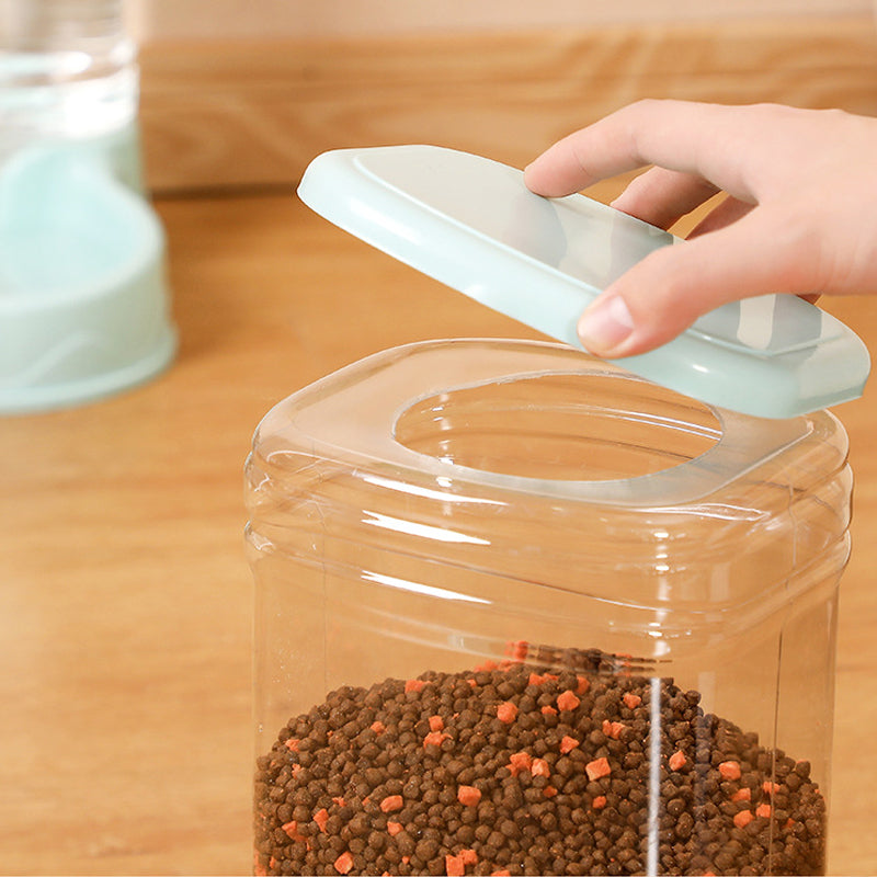 Pet feeder and water dispenser set for dogs and cats depiction of easy food refilling