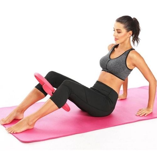 Pilates ring with foam handles for resistance training flexibility and core strengthening exercises model shot