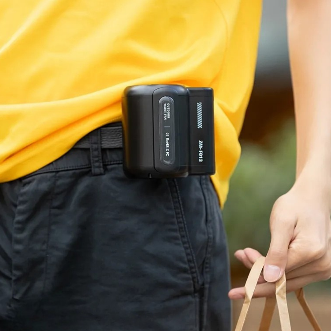 Portable USB cooling fan with clip and wearable design for outdoor work, travel, and sports alternate model shot with fan on waist on delivery