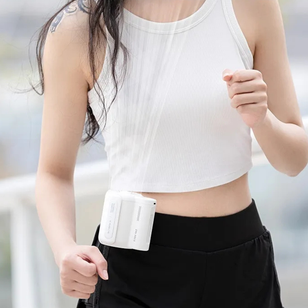Portable USB cooling fan with clip and wearable design for outdoor work, travel, and sports model shot with fan on waist on jogging