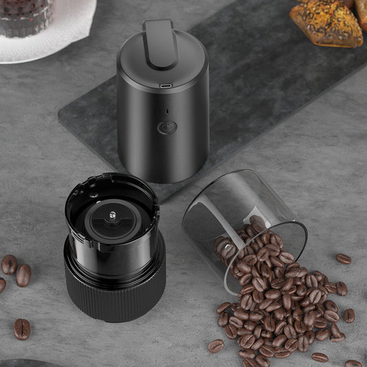 Portable coffee grinder with compact cordless design for fresh coffee at home office or travel
