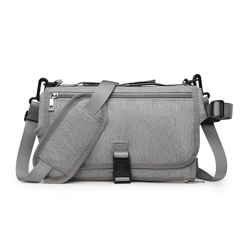 Portable folding baby diaper changing pad designed for travel, providing a clean and comfortable surface for diaper changes on the go in light gray color (Color: Light Gray)