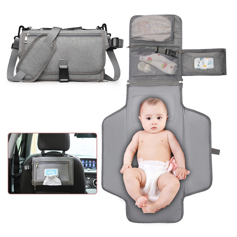Portable folding baby diaper changing pad designed for travel, providing a clean and comfortable surface for diaper changes on the go