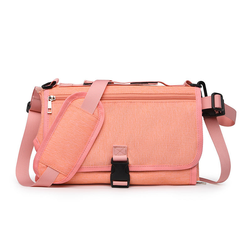 Portable folding baby diaper changing pad designed for travel, providing a clean and comfortable surface for diaper changes on the go in pink color (Color: Pink)