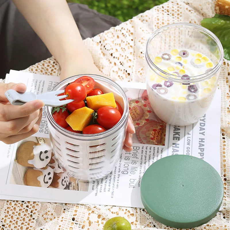 Portable fruit cup with strainer and fork leak proof snack container for fruit on the go alternate product shot