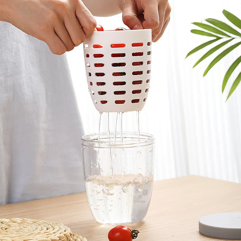 Portable fruit cup with strainer and fork leak proof snack container for fruit on the go depiction of strainer