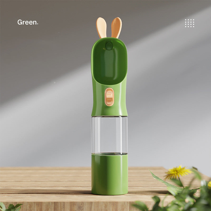 Portable pet water bottle with built-in food container designed for convenient travel and outdoor walks with cats and dogs in green color (Color: Green)