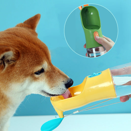 Portable pet water bottle with built-in food container designed for convenient travel and outdoor walks with cats and dogs