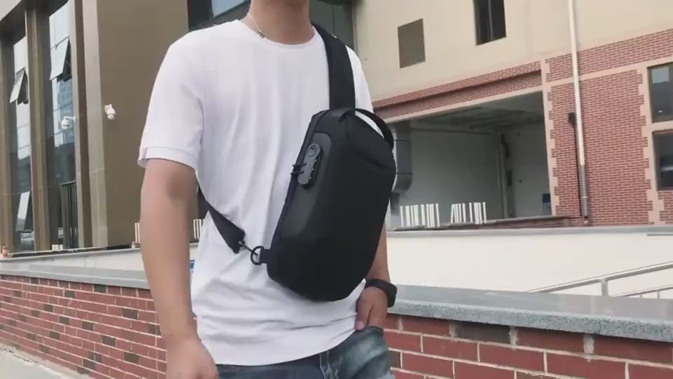 Men’s waterproof sling chest bag with USB charging port and security lock made from Oxford fabric for travel and everyday carry video
