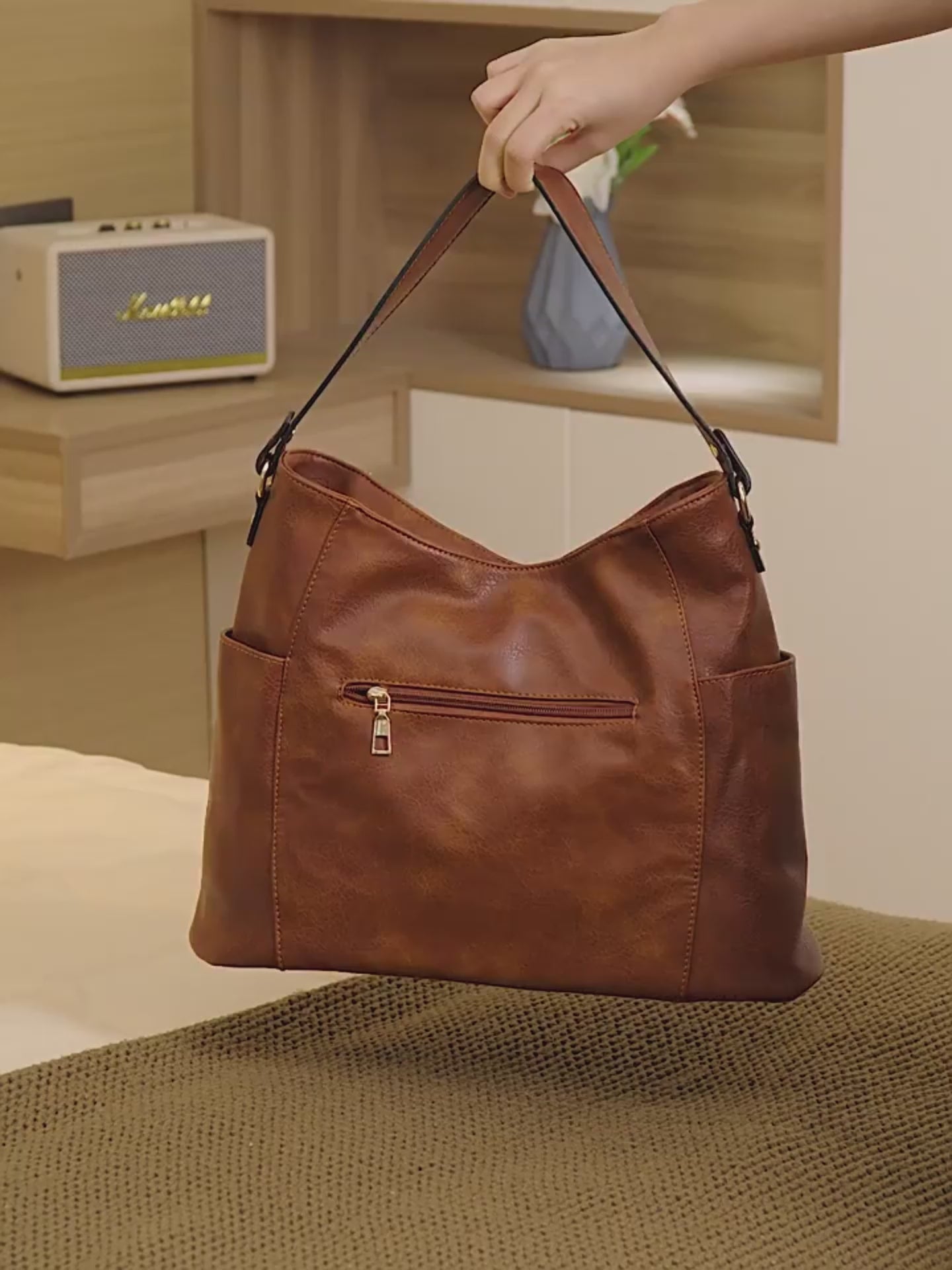 Women’s large capacity shoulder bag in brown color with soft leather look and multiple compartments for everyday use fashion video
