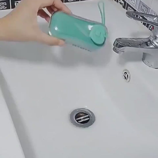 Liquid dispensing shoe cleaning brush with ergonomic grip for washing shoes, clothes, and household items video