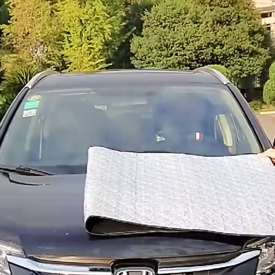 Silver car windshield snow and sun protection cover for frost, ice, dust, and UV protection video