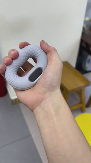 Electronic hand grip strength trainer with built-in counter, designed to track grip exercises and improve hand and forearm strength video