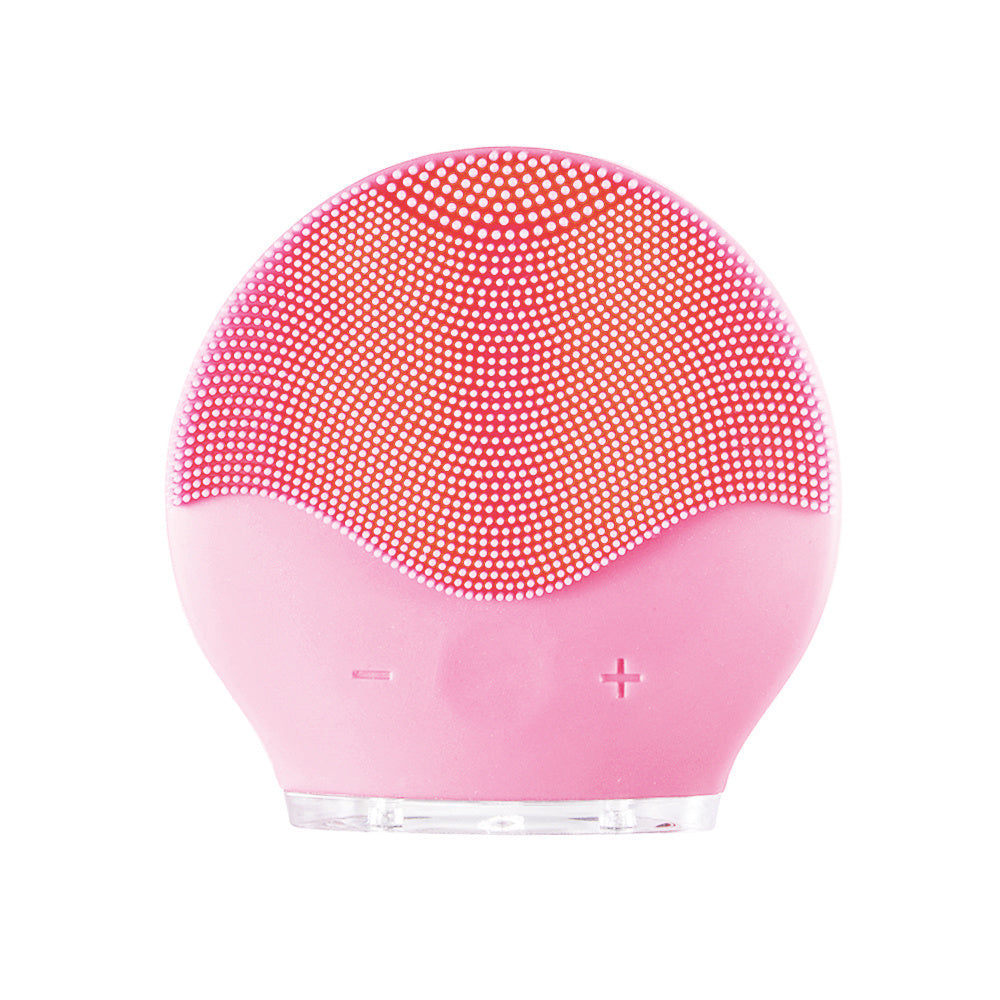 Rechargeable silicone face cleanser device in pink color for deep facial cleansing and gentle skin massage (Color: Pink)