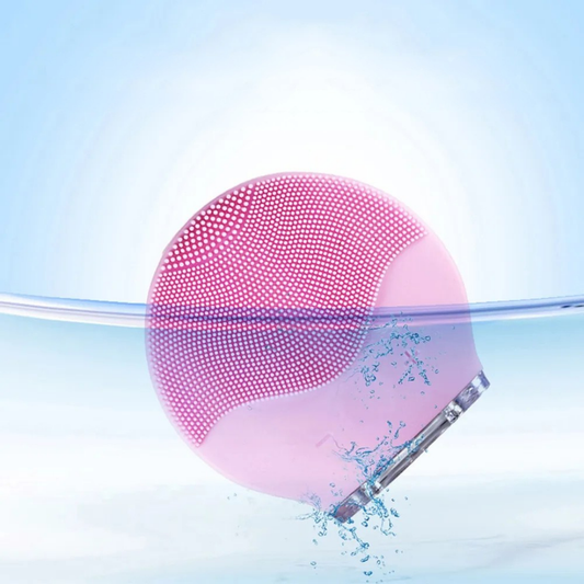 Rechargeable silicone face cleanser device for deep facial cleansing and gentle skin massage depiction of waterproof feature