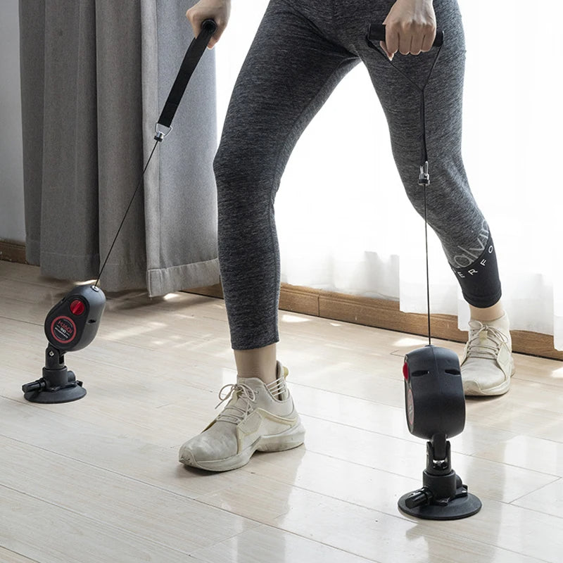 Resistance pull down rope trainer with suction base for home workouts model shot