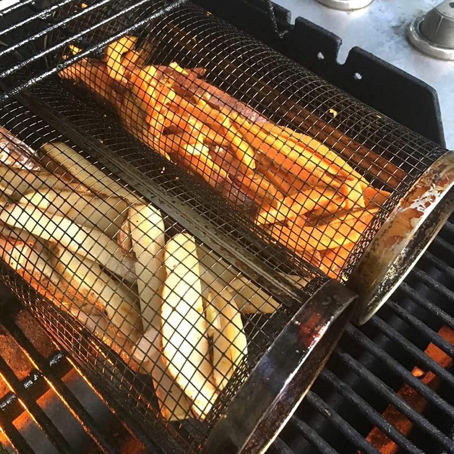 Rolling barbecue grilling basket with stainless steel mesh design for evenly cooking vegetables seafood and small foods alternate depiction of use