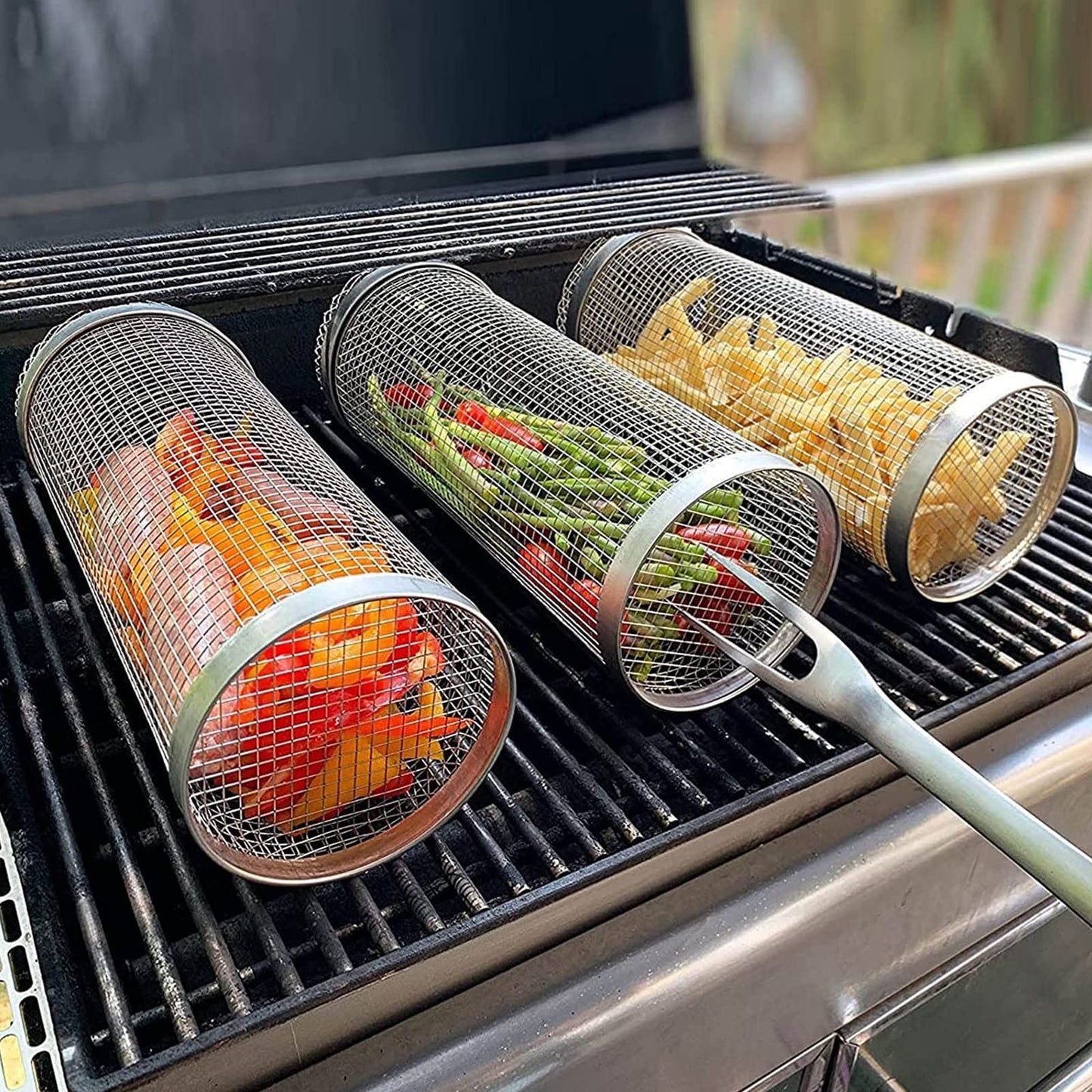 Rolling barbecue grilling basket with stainless steel mesh design for evenly cooking vegetables seafood and small foods depiction of use