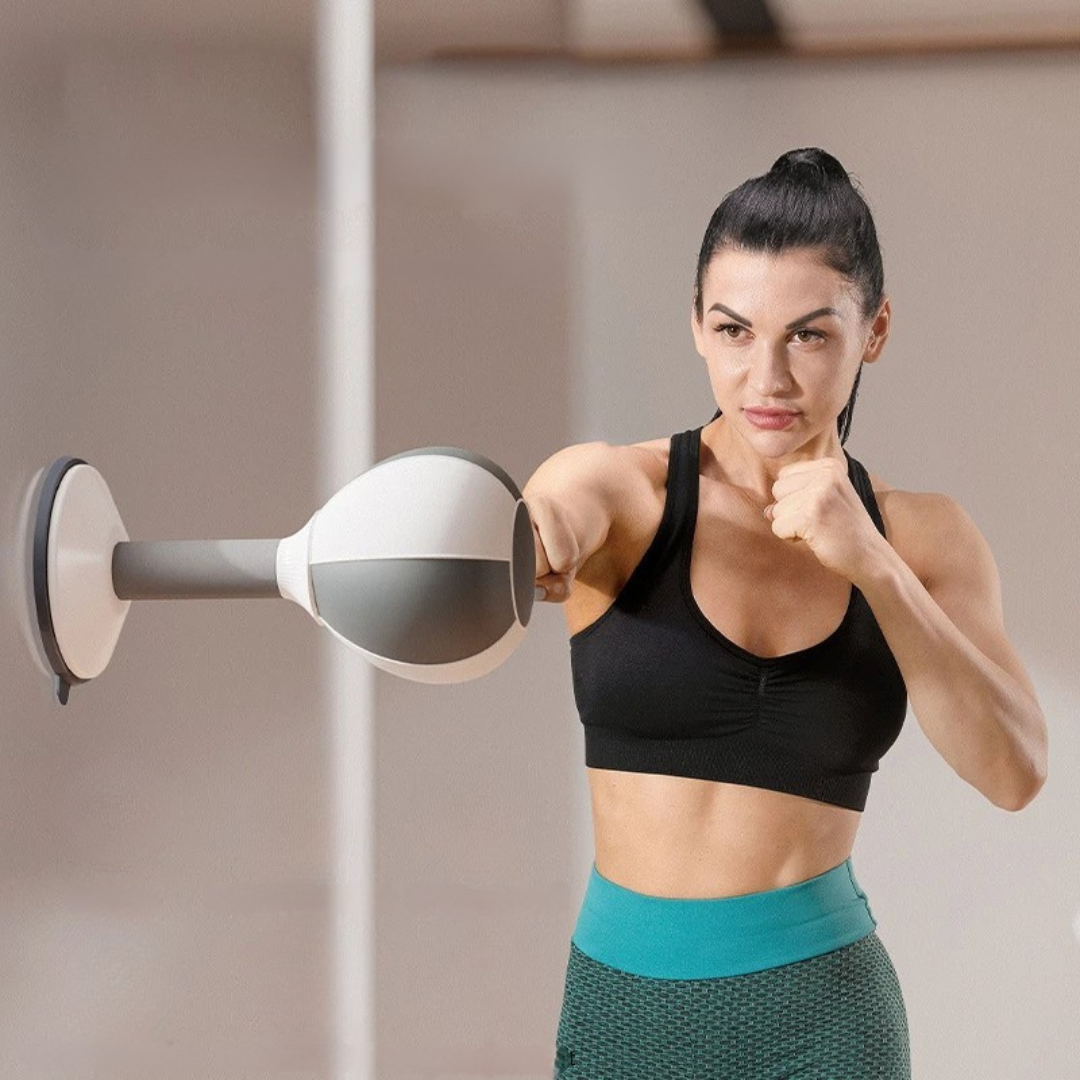 Sit up and boxing reflex trainer with suction base for core workouts and reaction training depiction of versatile wall use