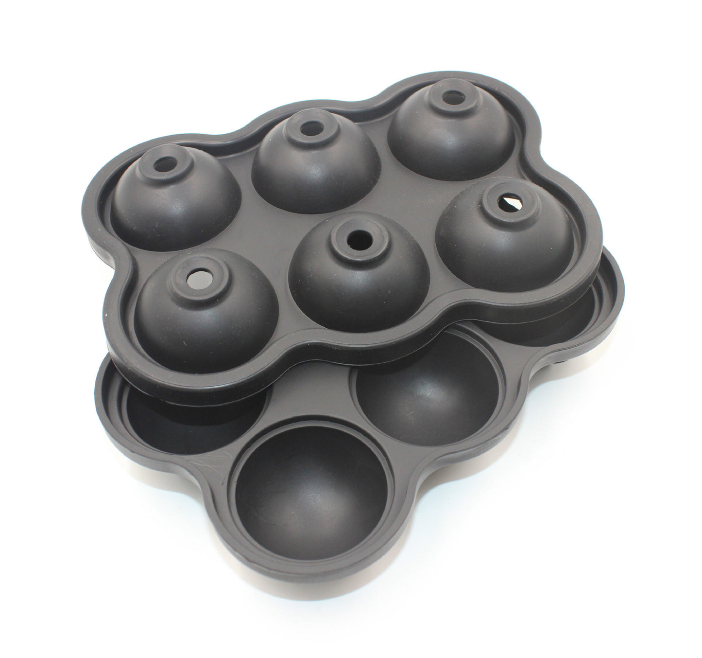 Six cell ice sphere ball tray depicting two parts on top of each other