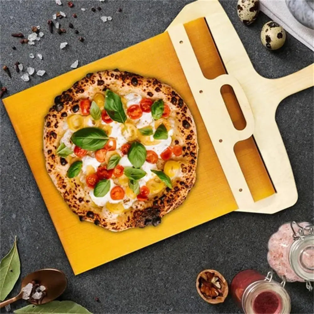 Sliding pizza dough transfer board for easily moving raw dough and flour-coated pizza bases to the oven birds eye view