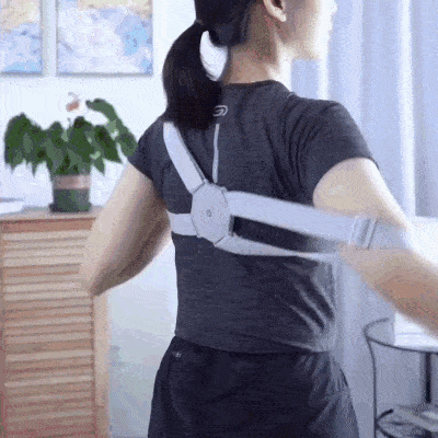 Smart posture corrector with vibration reminders adjustable straps and breathable ergonomic support gif