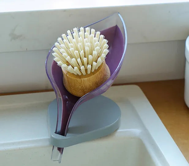 Suction cup sink soap and sponge holder with drain design for organizing kitchen cleaning tools with cleaning brush