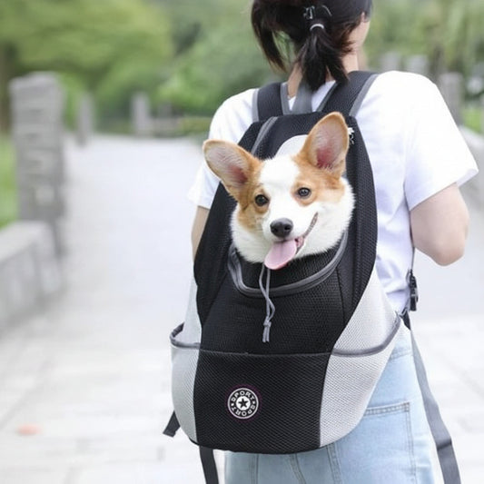 Travel dog backpack with breathable mesh design adjustable safety straps and storage pockets for pets model shot