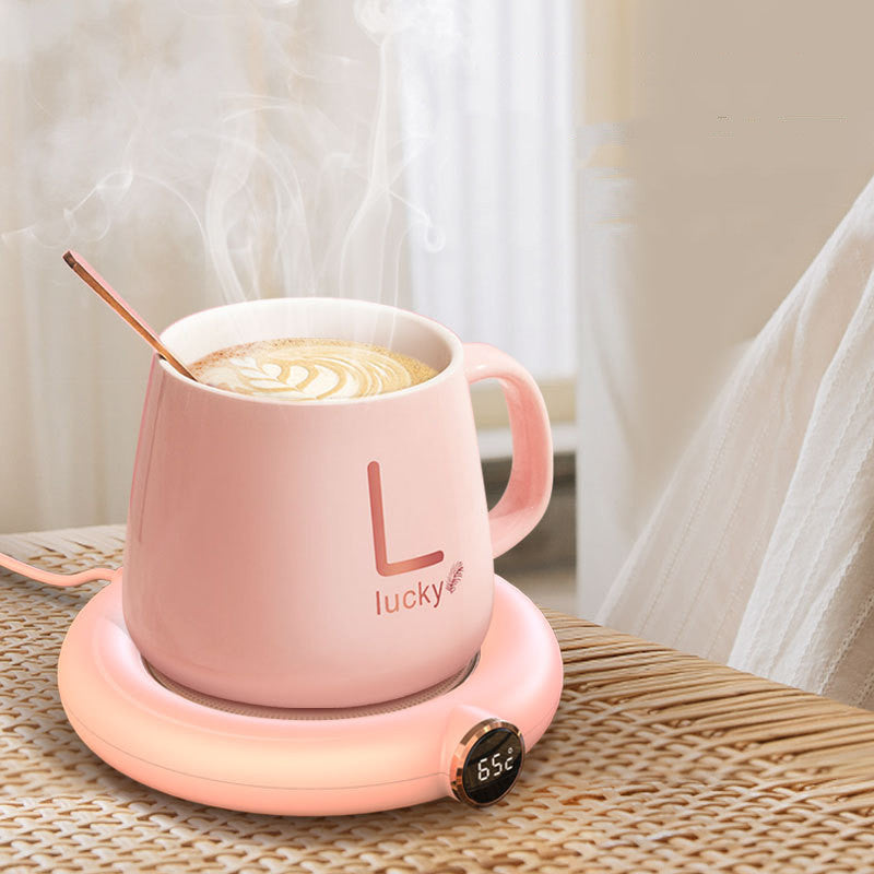 USB coffee mug warmer plate in pink color designed to keep beverages like coffee and tea warm on desks and tables (Color: Pink)