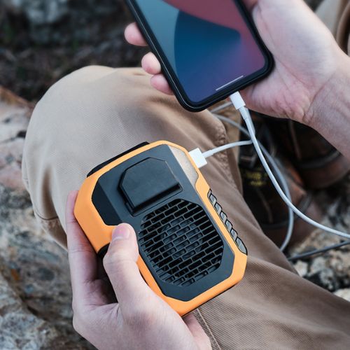Wearable and portable cooling fan with rechargeable battery adjustable speeds and hands free design depiction of use as powerbank
