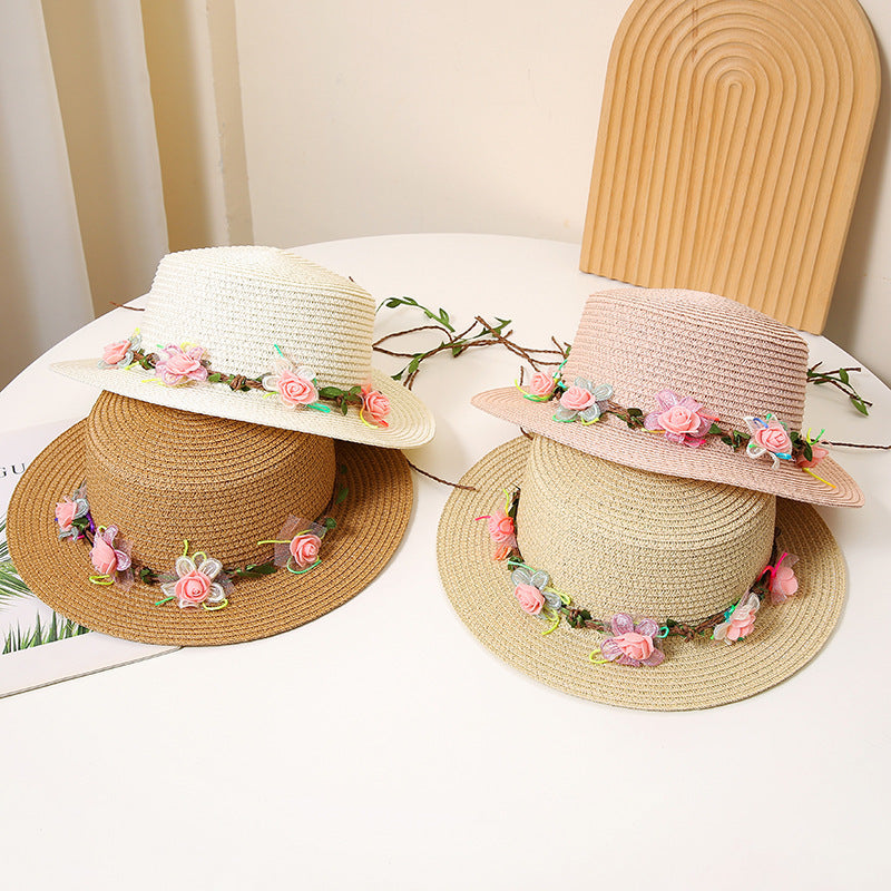 Women’s flat top straw sun hat with wide brim and breathable design for beach and summer wear