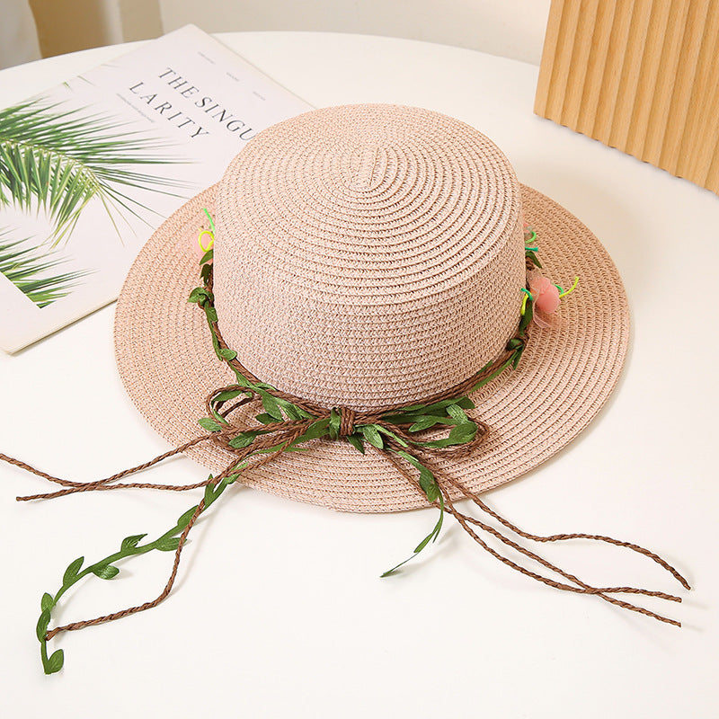 Women’s flat top straw sun hat with wide brim in pink color and breathable design for beach and summer wear (Color: Pink)
