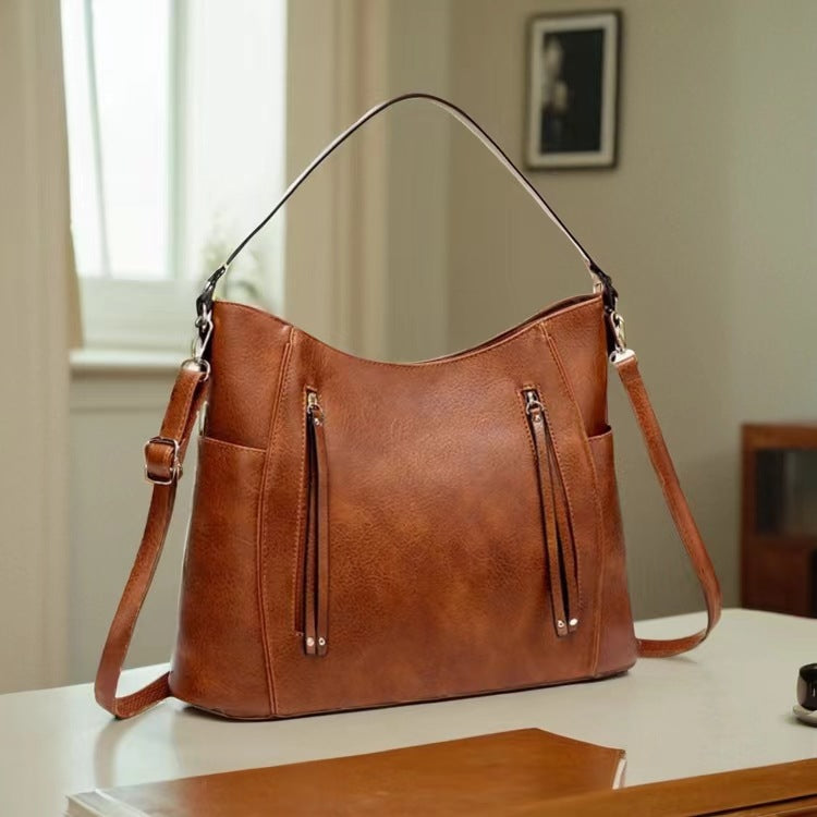 Women’s large capacity shoulder bag with soft leather look and multiple compartments for everyday use product shot
