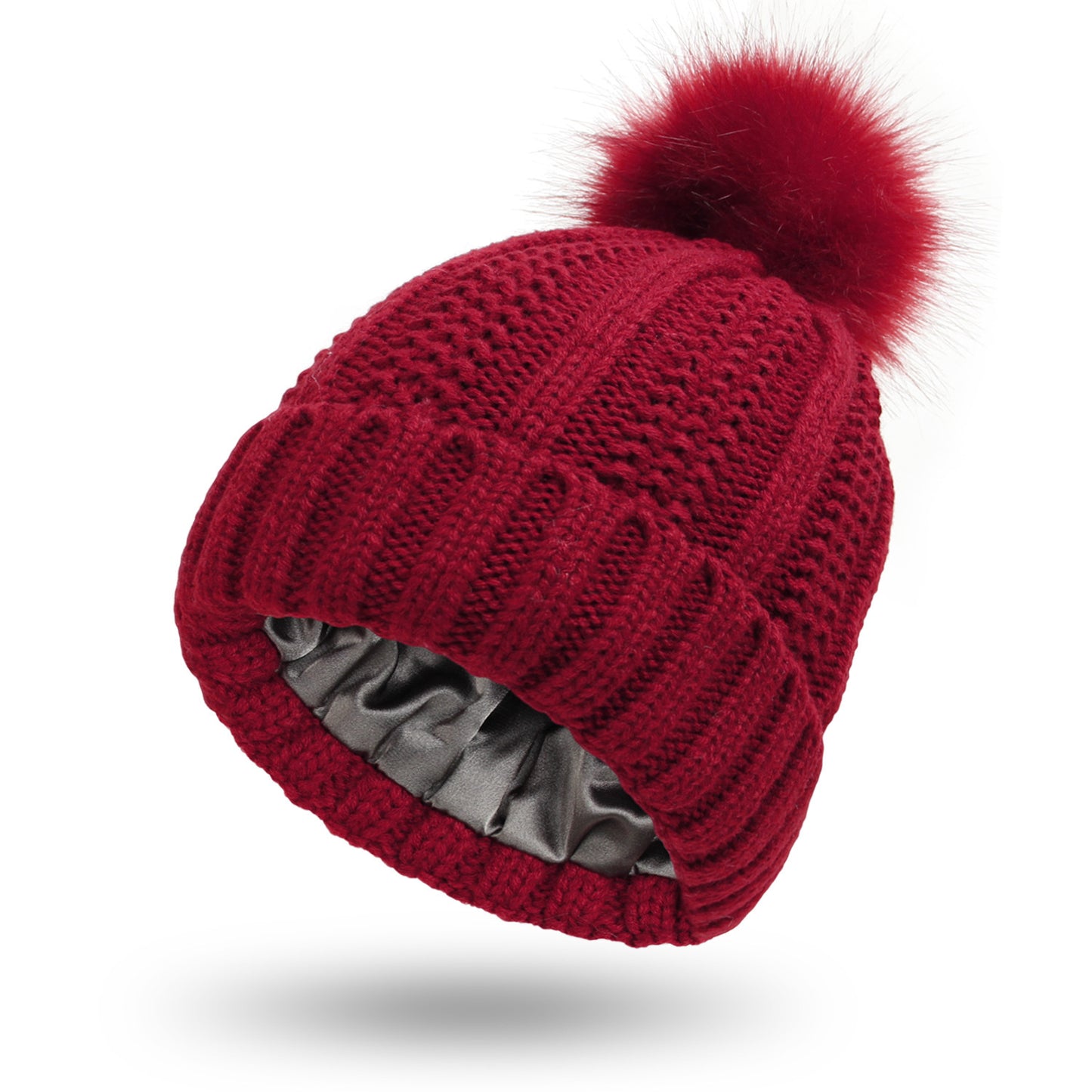 Women’s satin-lined knit beanie in red color with faux fur pom pom designed to keep hair protected and warm in winter (Color: Red)