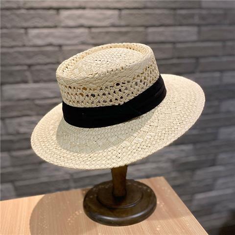 Women’s straw sun protection hat in beige color with breathable design and stylish black band for summer wear (Color: Beige)