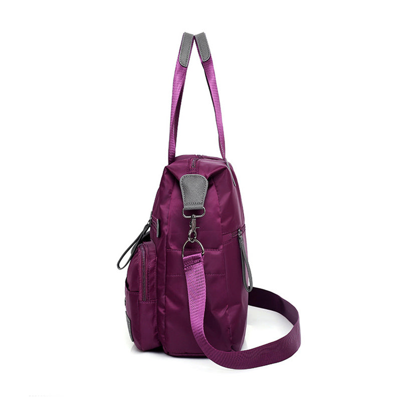 Women’s waterproof multi-pocket shoulder bag with large capacity for everyday commuting and casual use product shot side