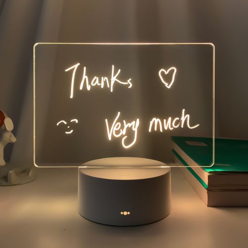 Writable LED night light board with colorful lighting for messages drawings and room decor depiction of message with yellow light